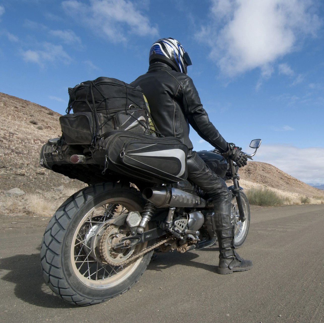 motorcyclist stops to appreciate view