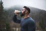 sportsman drinking protein outdoor
