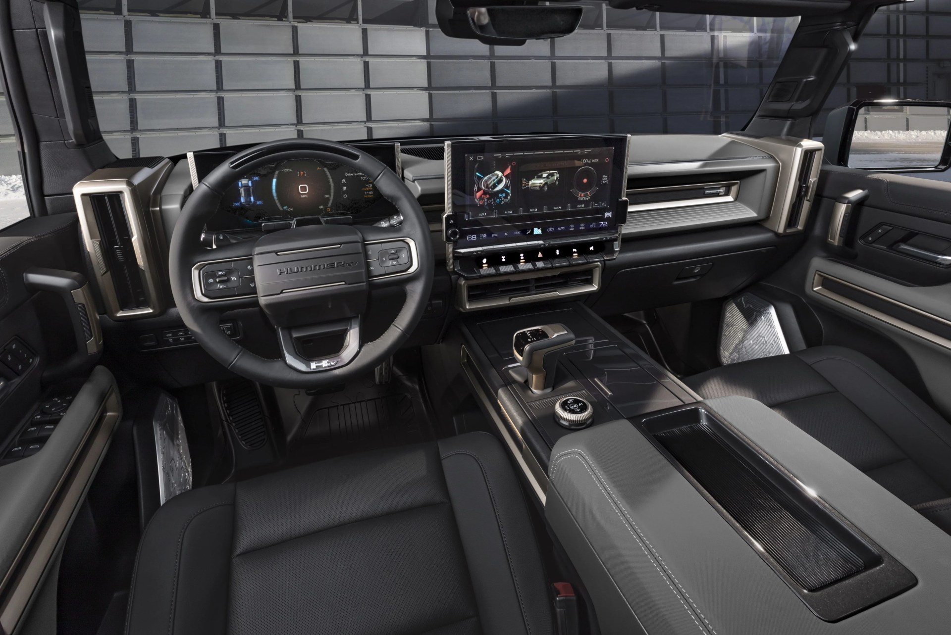 the gmc hummer ev suv debuts in the low contrast lunar shadow interior and includes a spacious cargo area and an architecturally inspired cabin