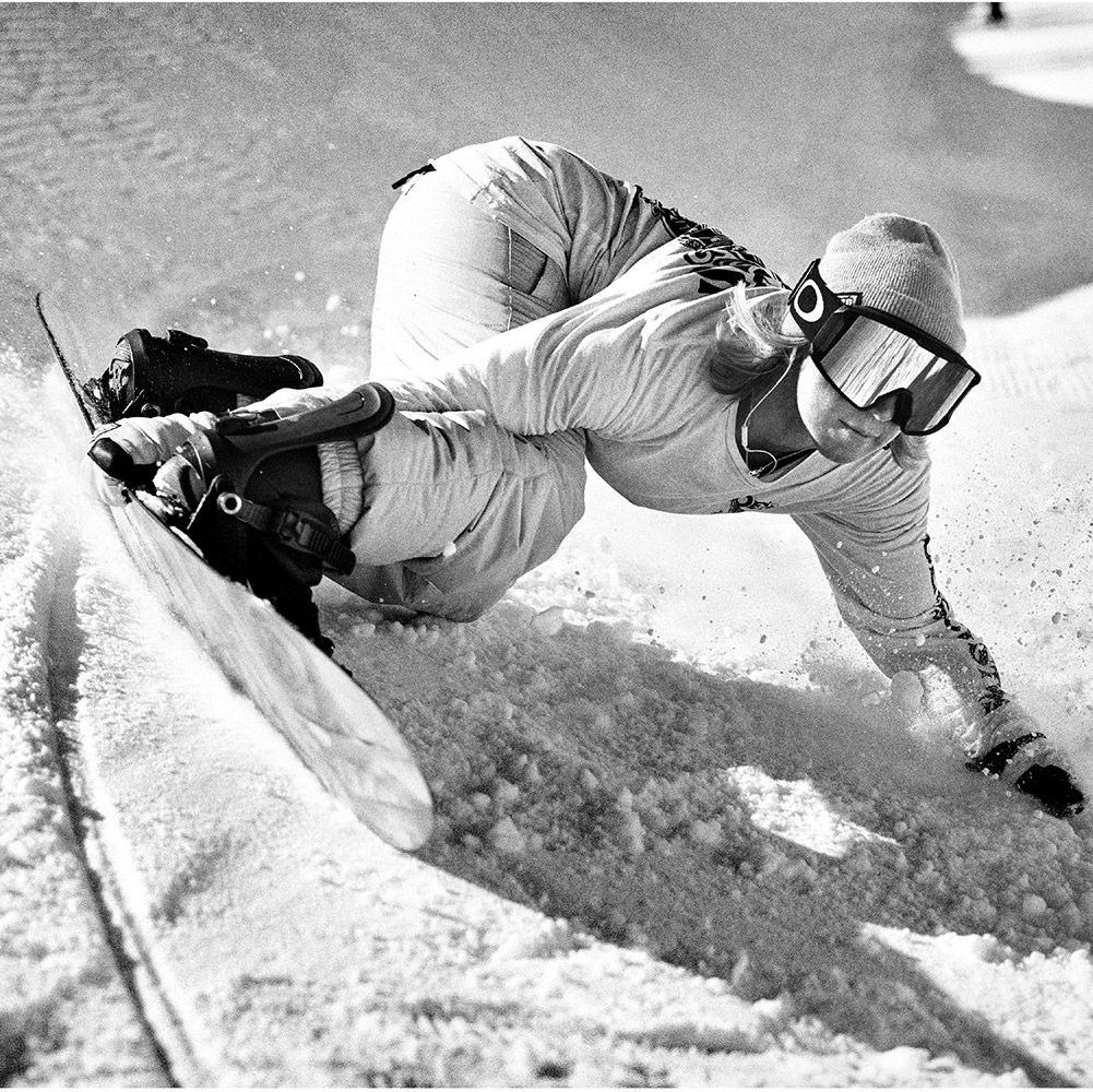 christy prior carving on a snowboard