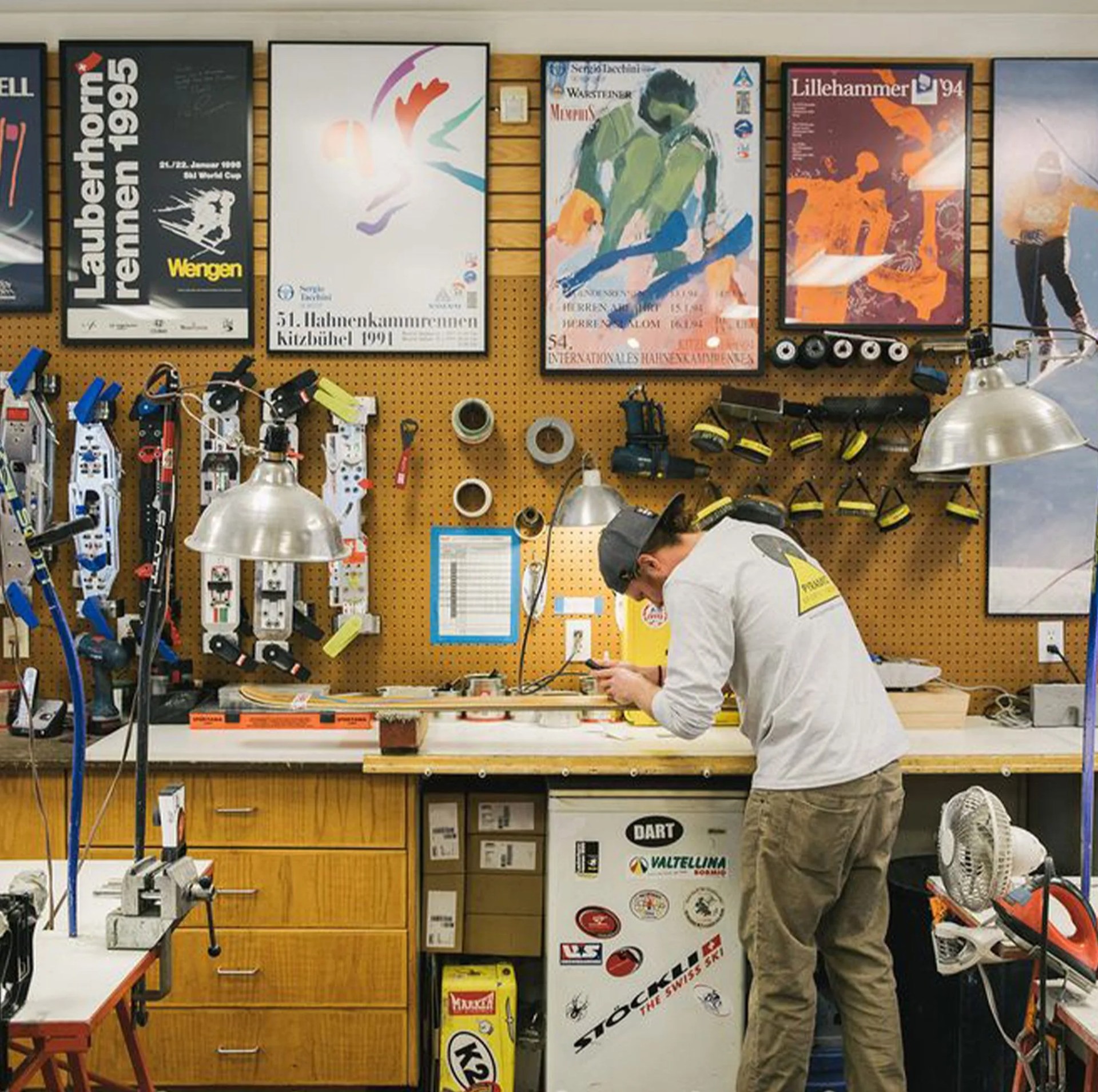 man waxing his skis