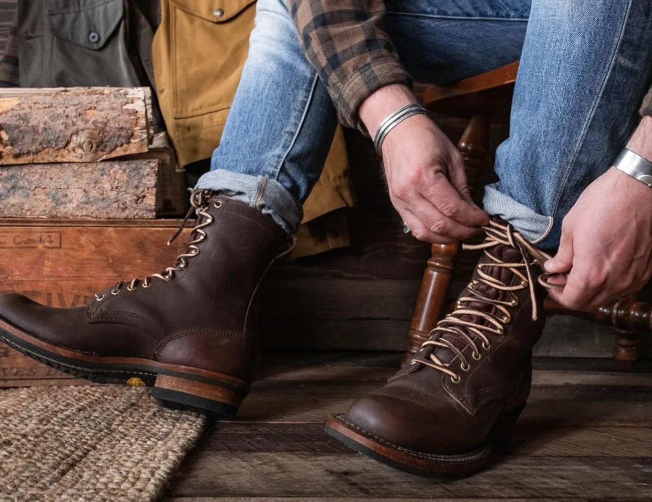someone tying white’s boots
