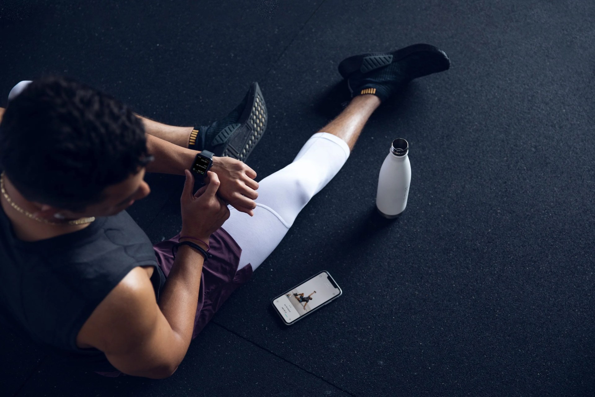 future fitness man looking at app