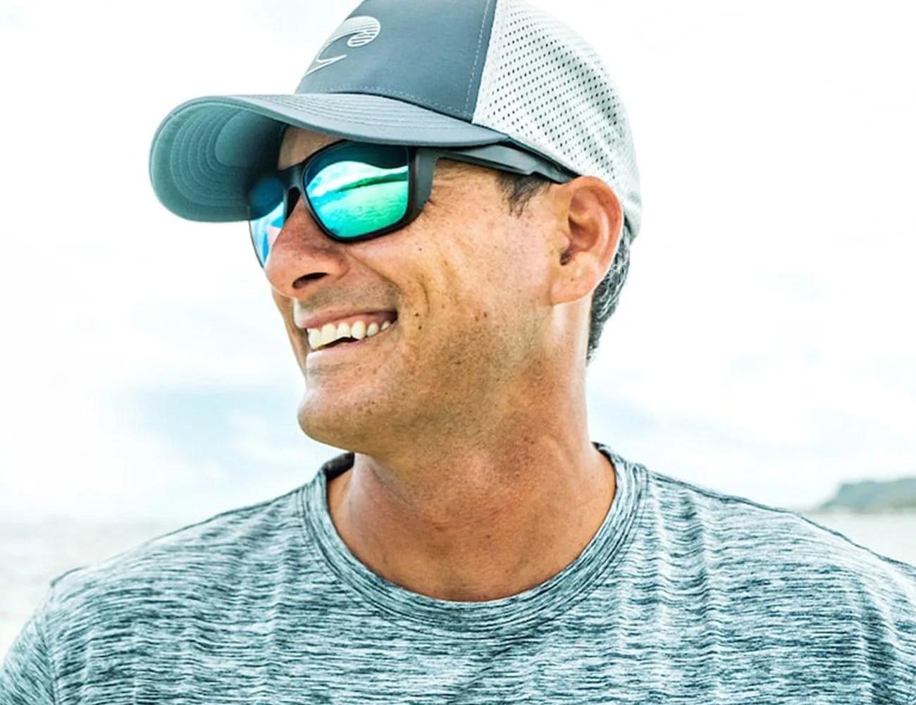 man wearing costa sunglasses