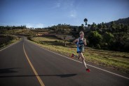 a man running on an empty road