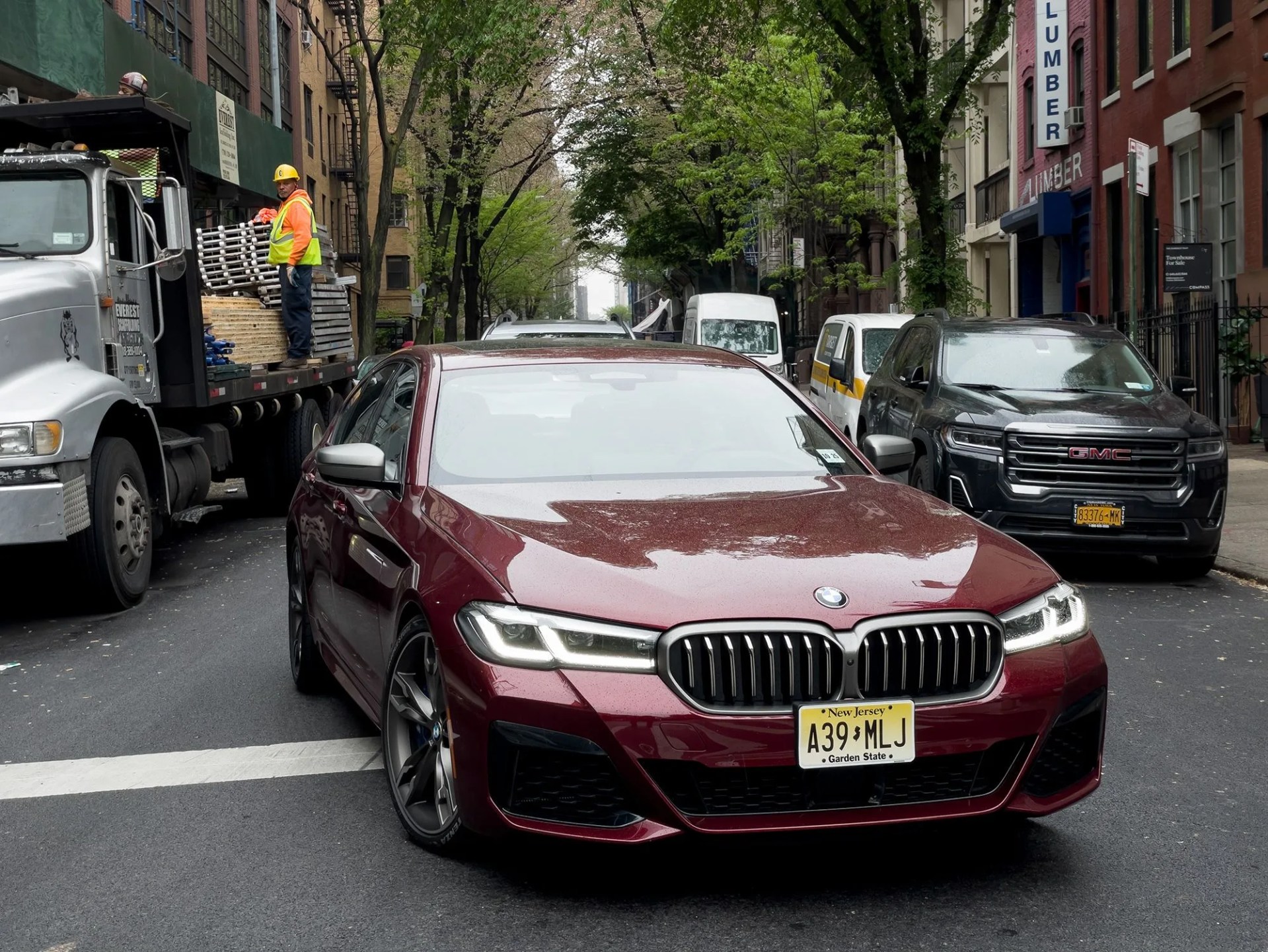 bmw m550i maroon red 2021