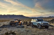 pre production versions of the 2021 bronco, shown here, include bronco two door in cyber orange metallic tri coat and bronco four door in cactus gray