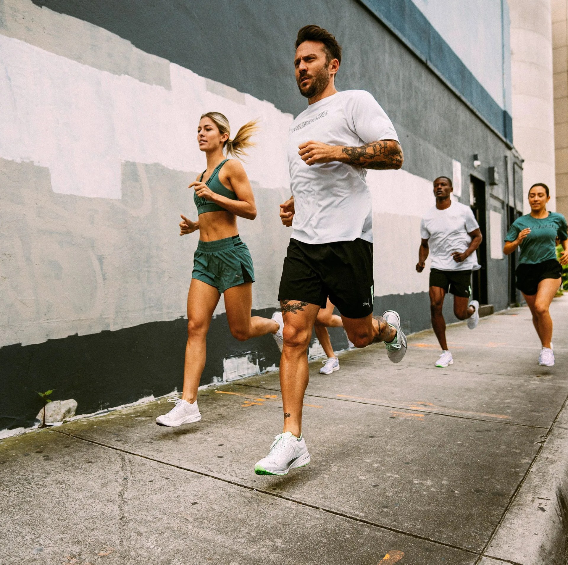 puma group of people running