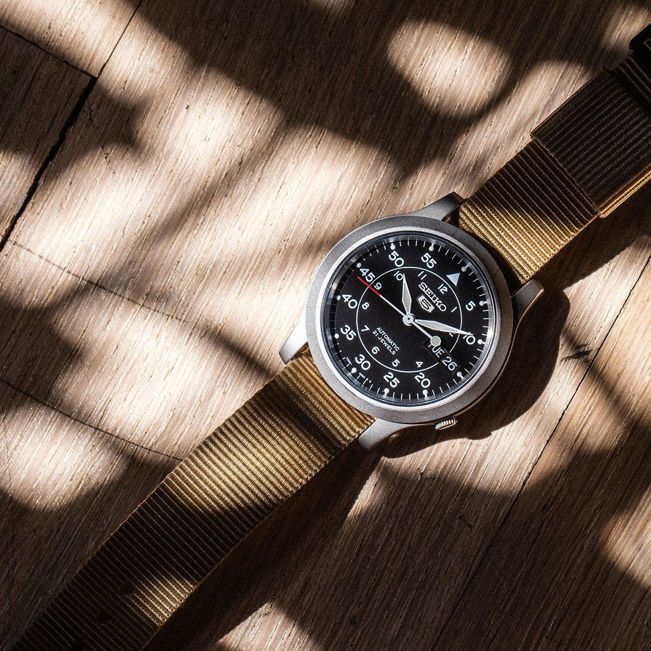 seiko snk field watch with plant shadows