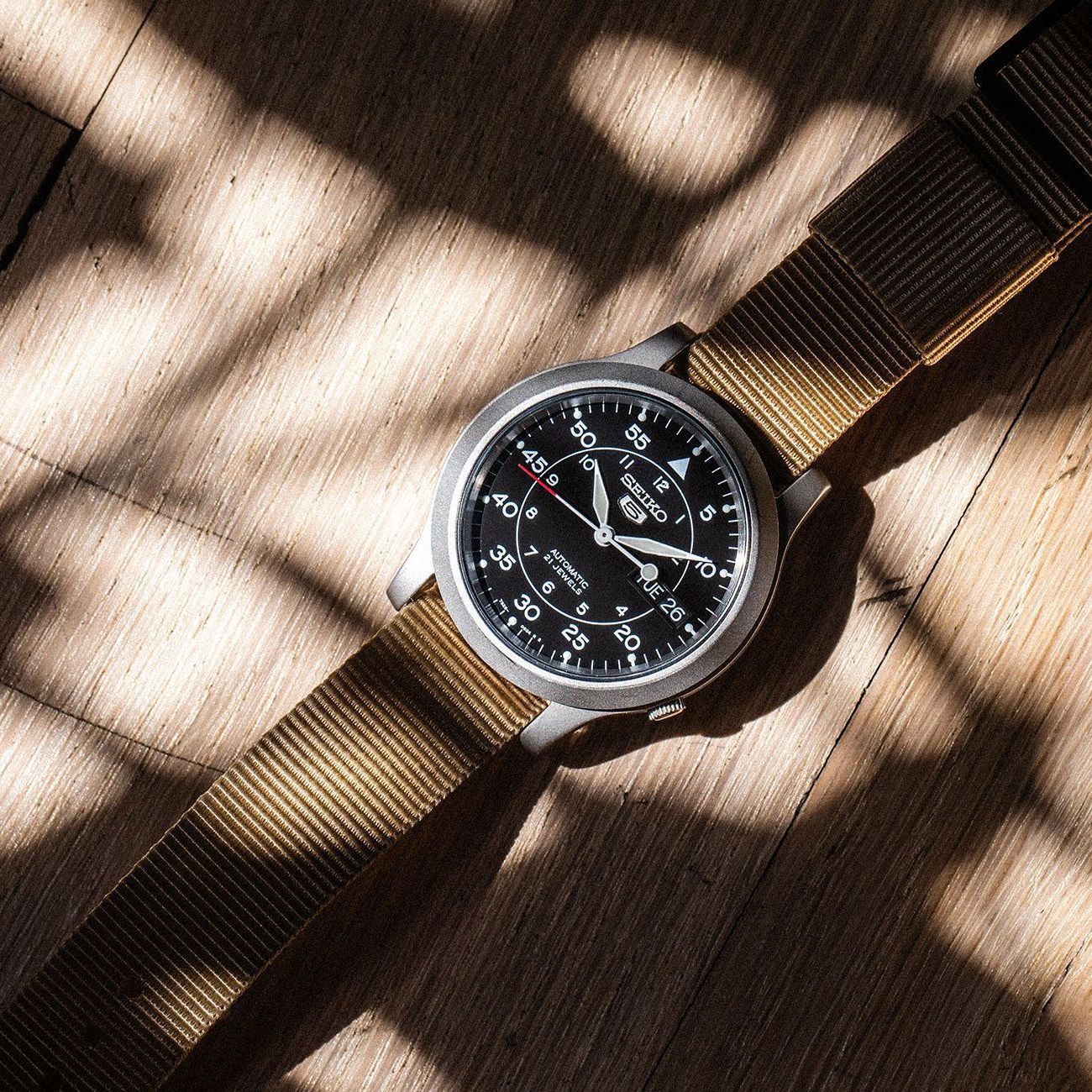 seiko snk field watch with plant shadows