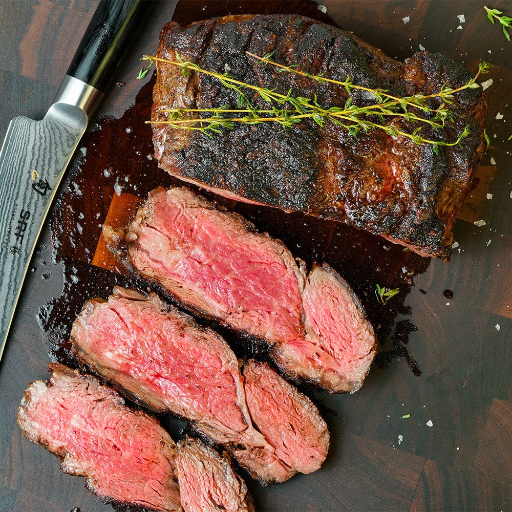snake river farms cap of ribeye beef cooked and cut into slices