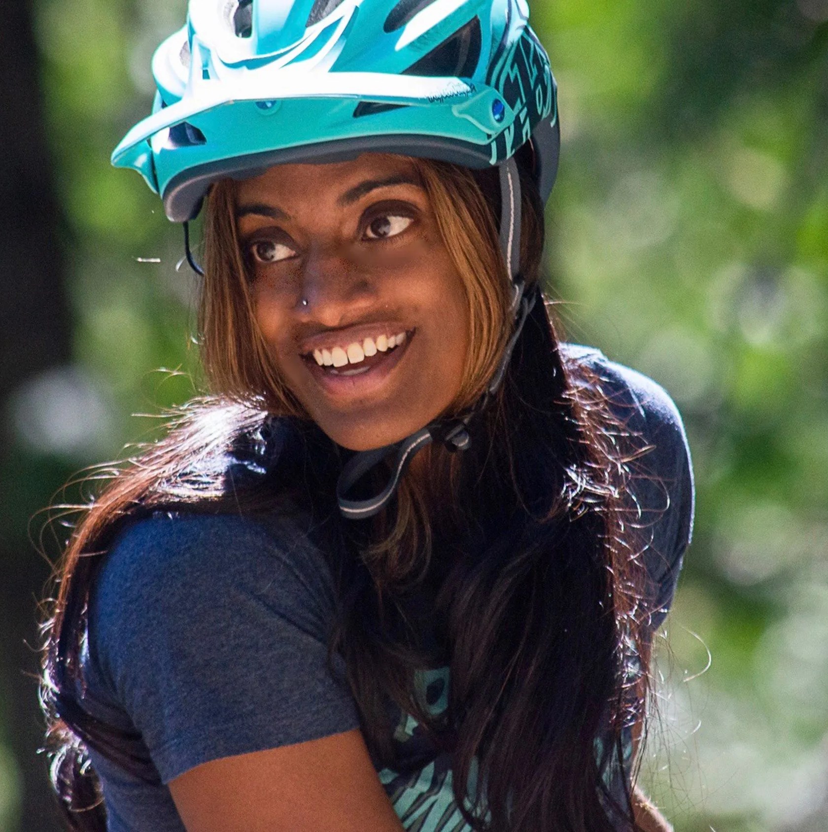 anita naidu wearing a bike helmet