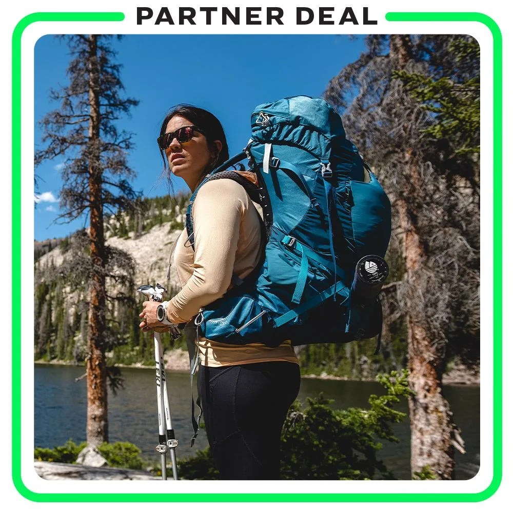 woman wearing backcountry gear hiking