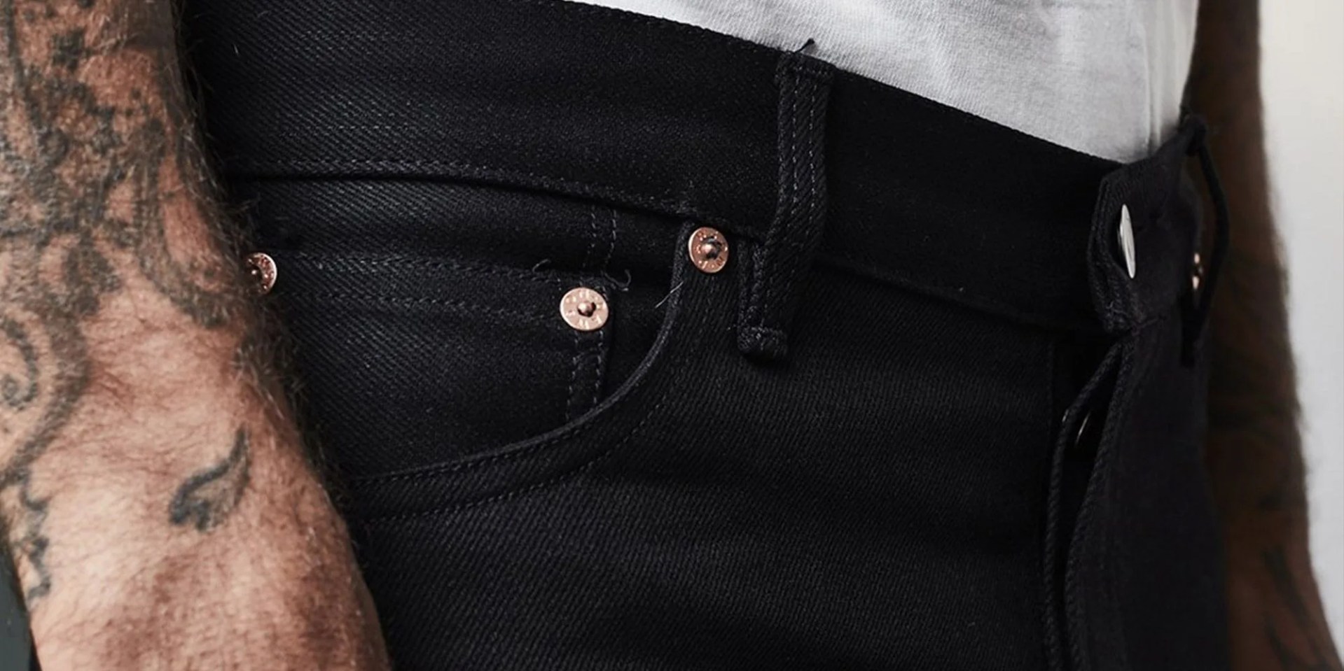 man wearing black jeans