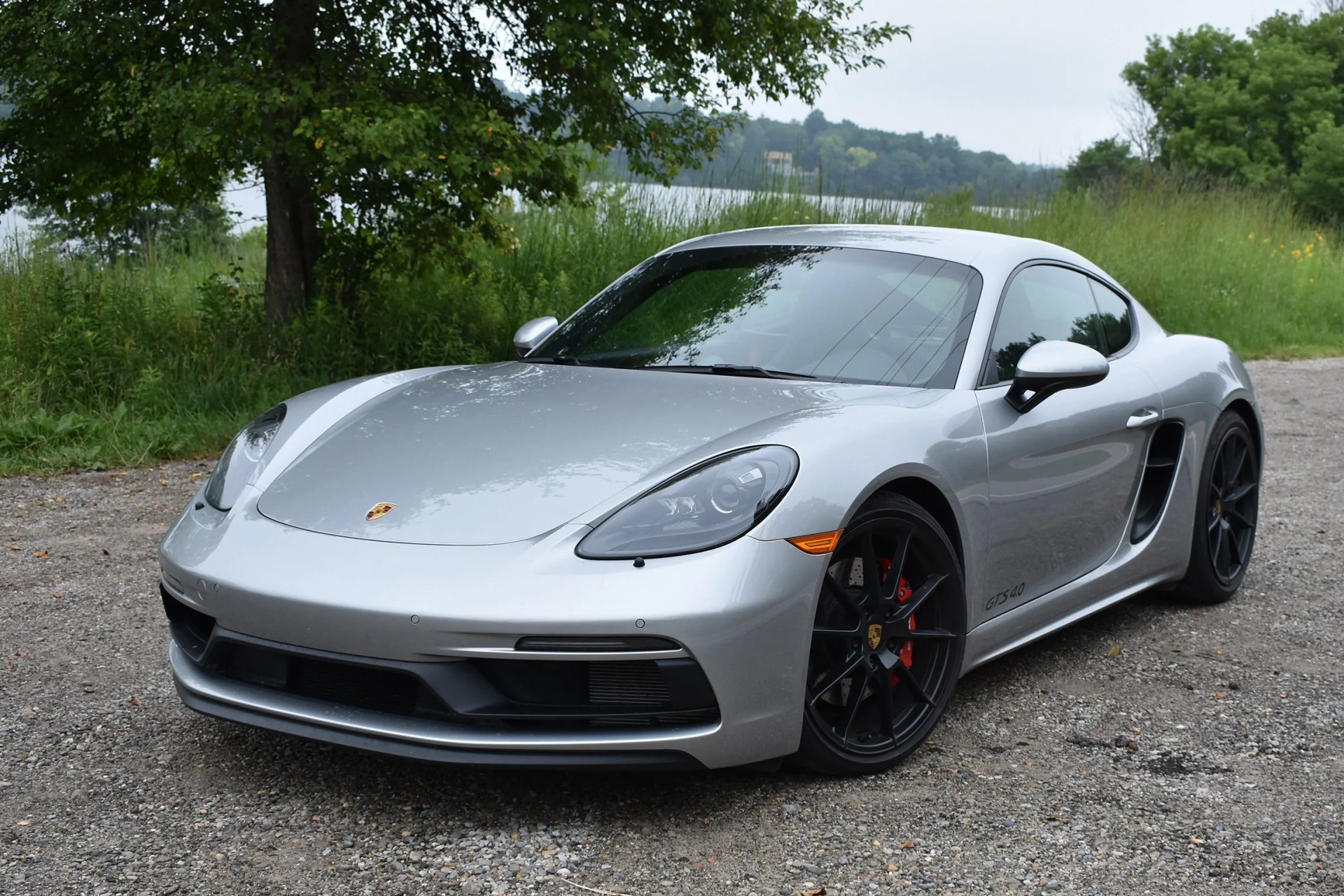 silver porsche cayman gts 4