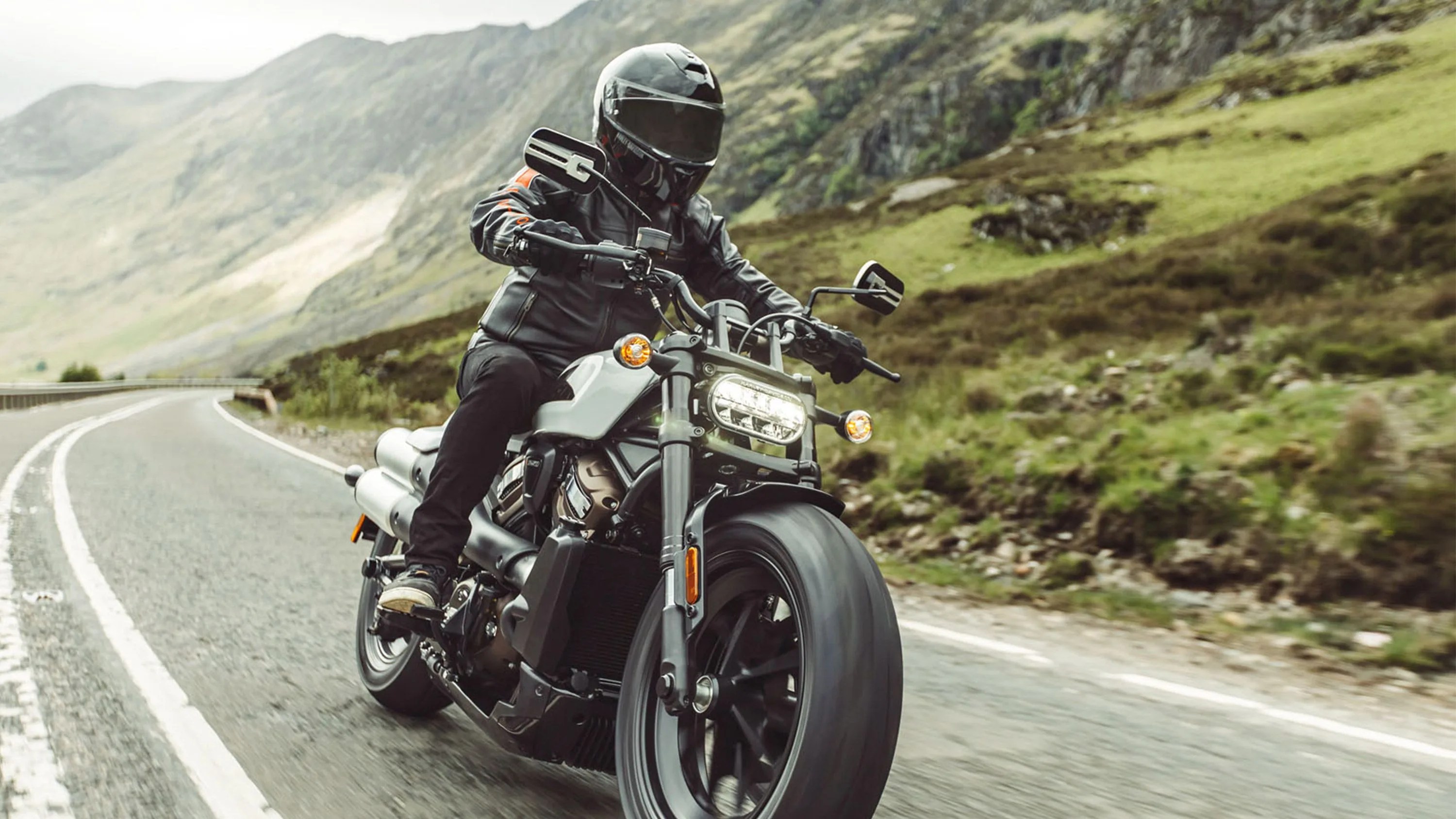 person riding harley davidson sportster s
