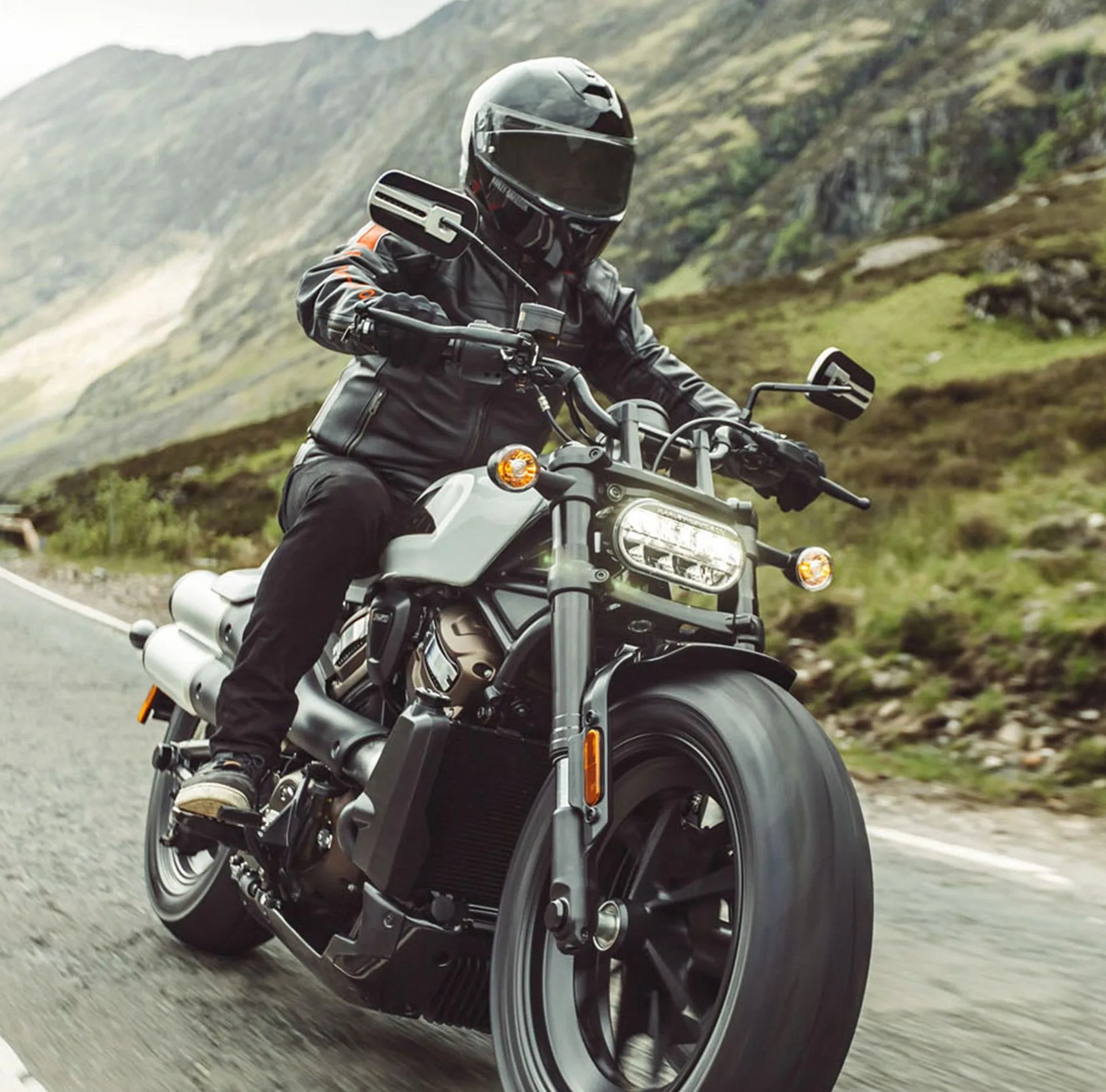 person riding harley davidson sportster s