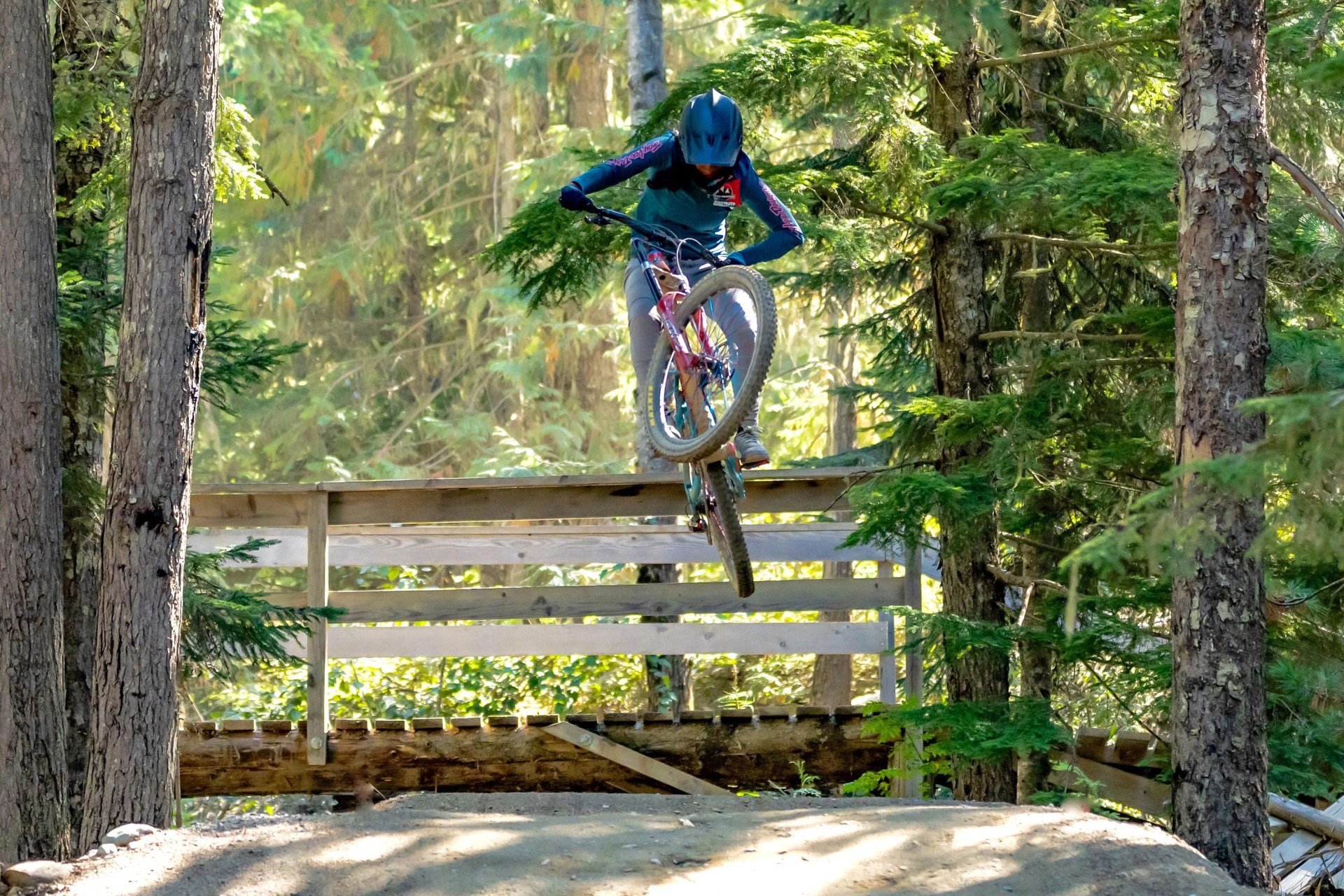 anita naidu catching air on her bike