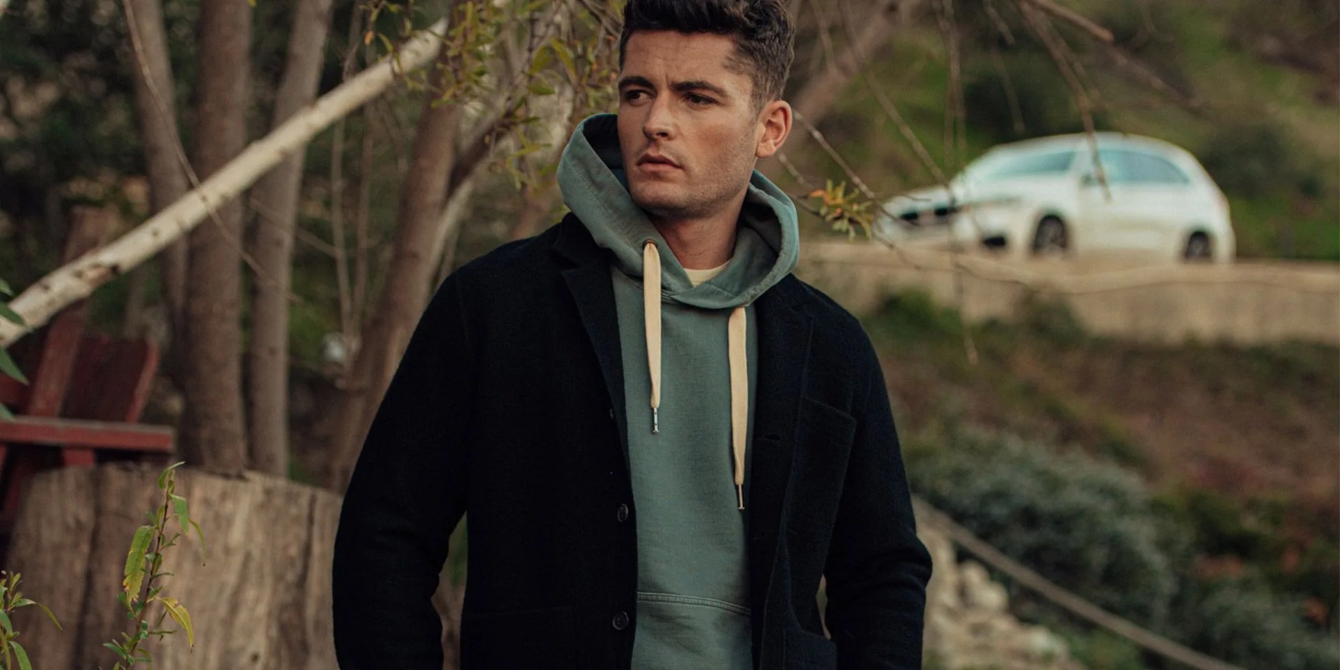 man wearing buck mason sweater