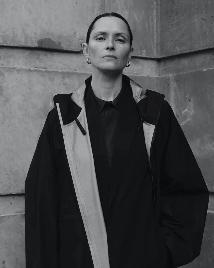 woman wearing veilance clothing