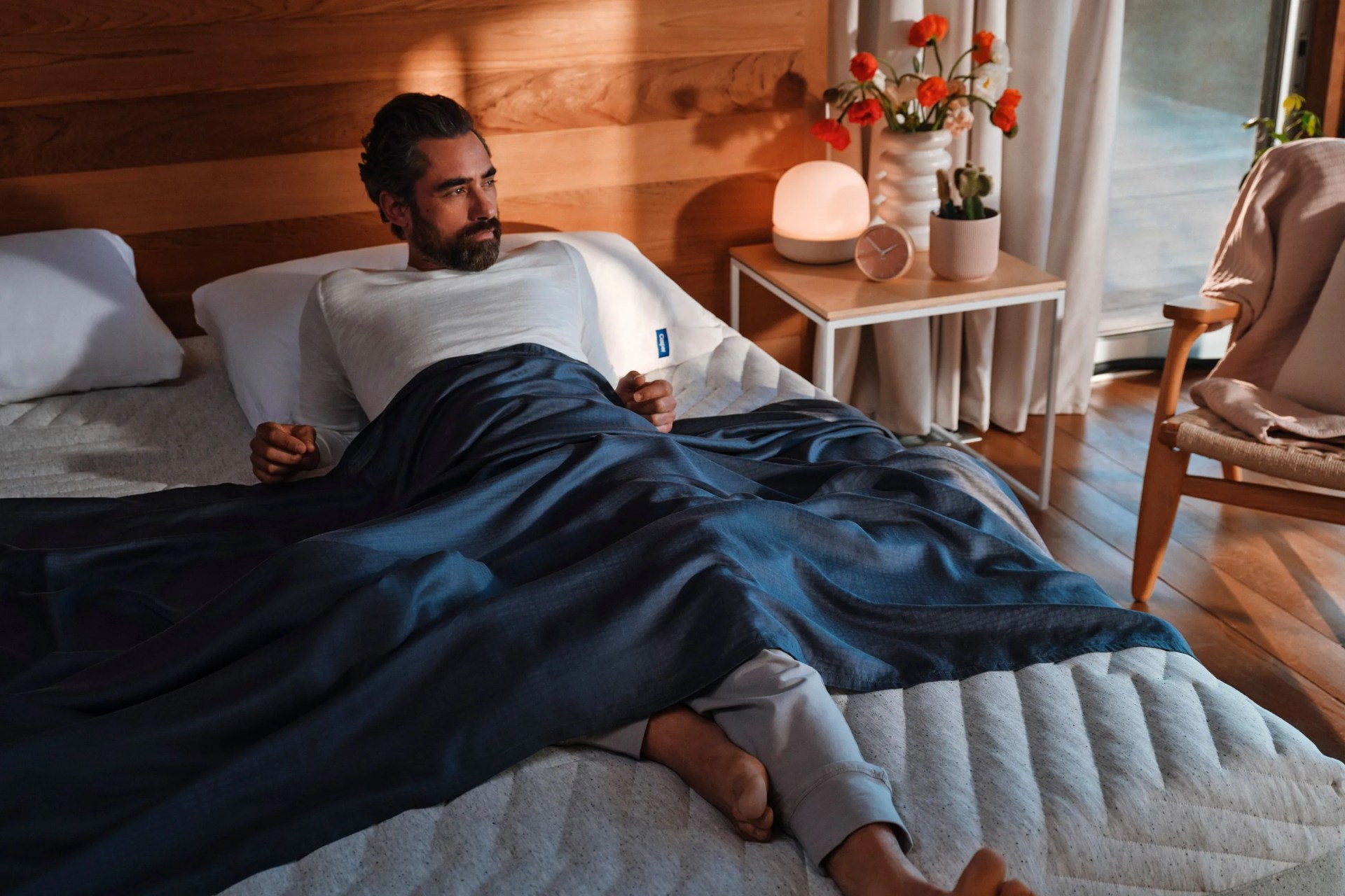 man laying on casper mattress