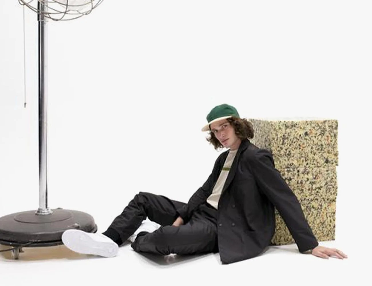 man wearing hermanos koumori blazer and pants
