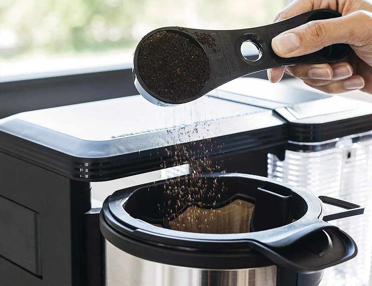 putting coffee grinds into ninja specialty coffee maker