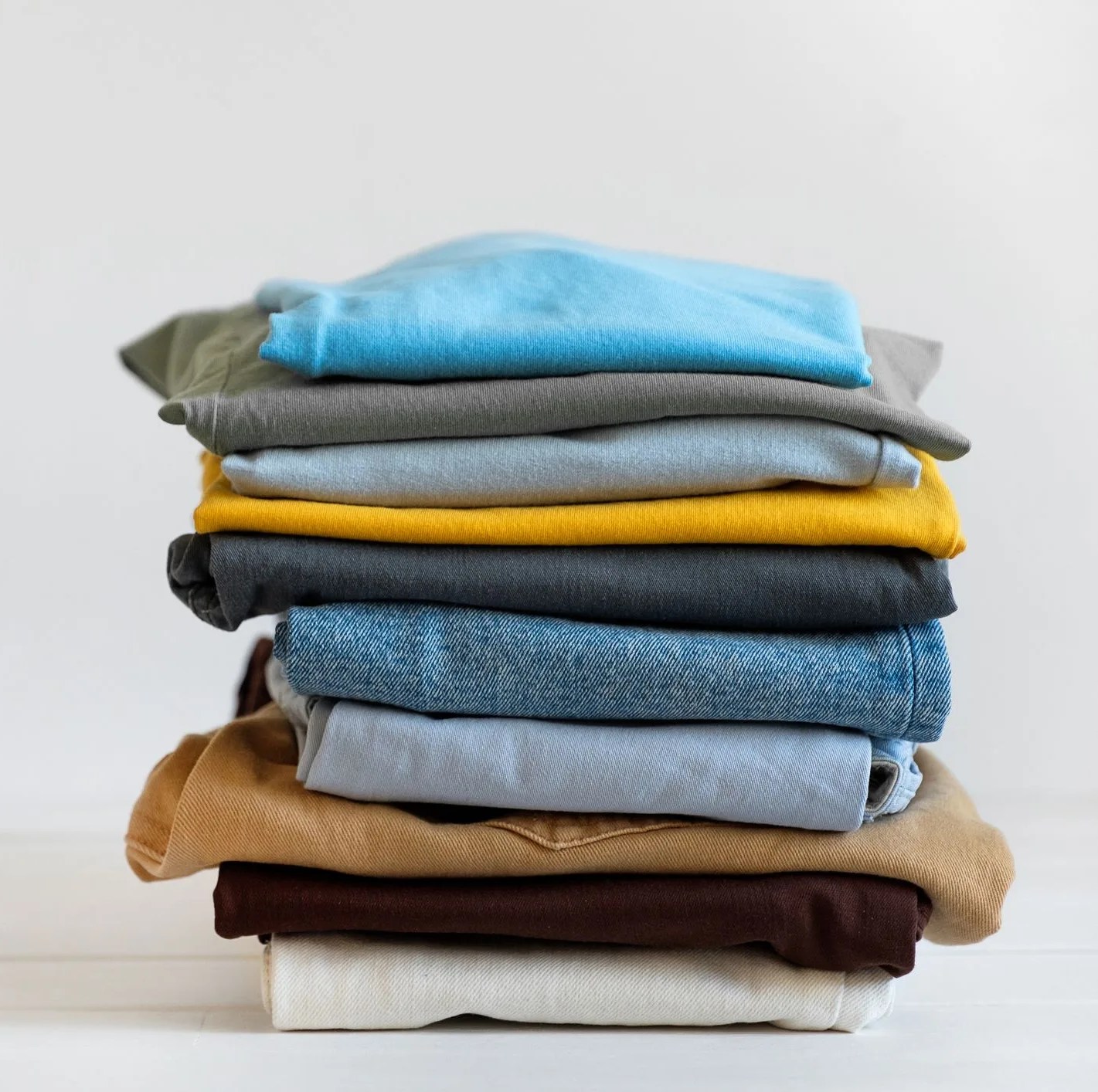 a stack of folded clothing