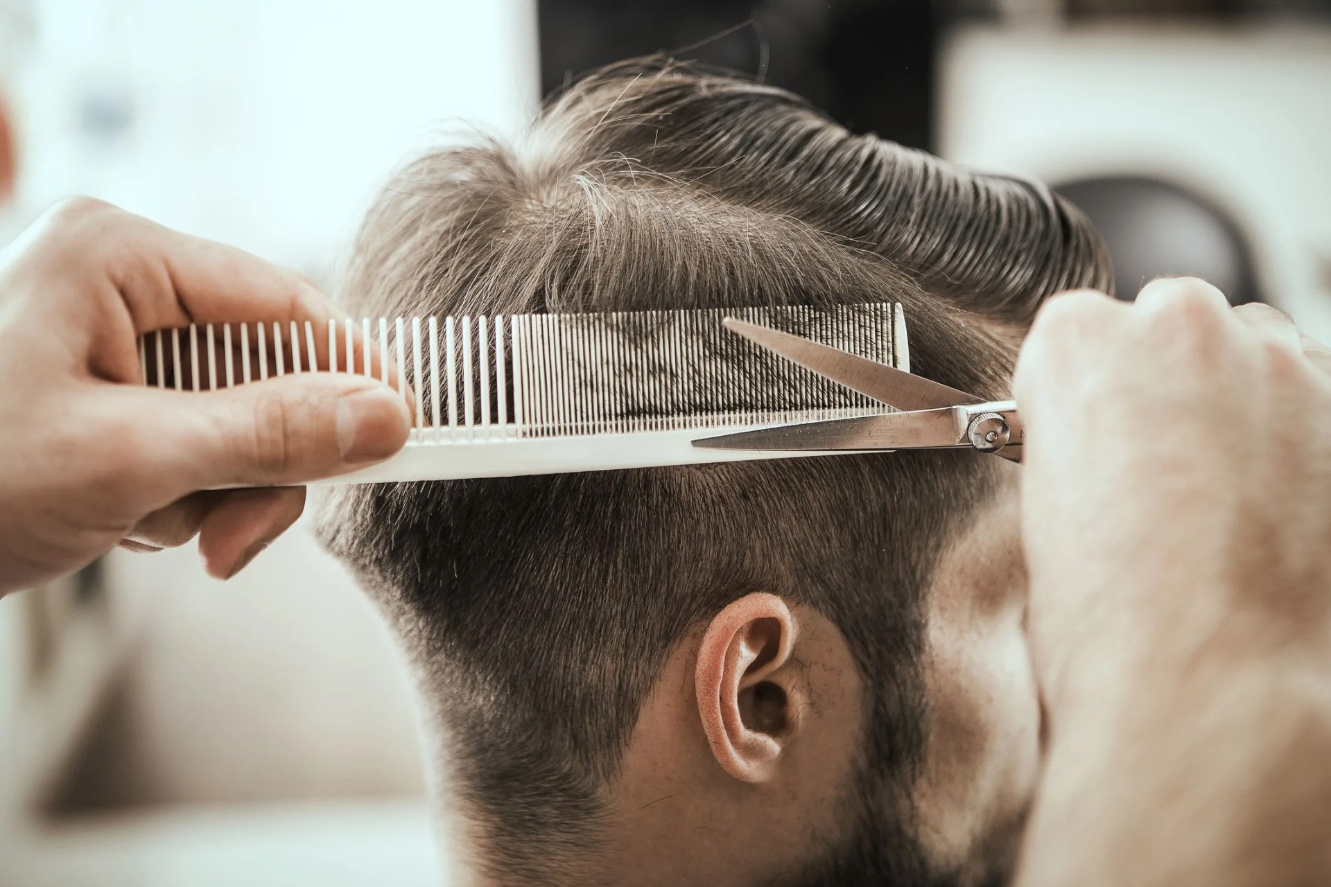styling hair by professional hairdresser