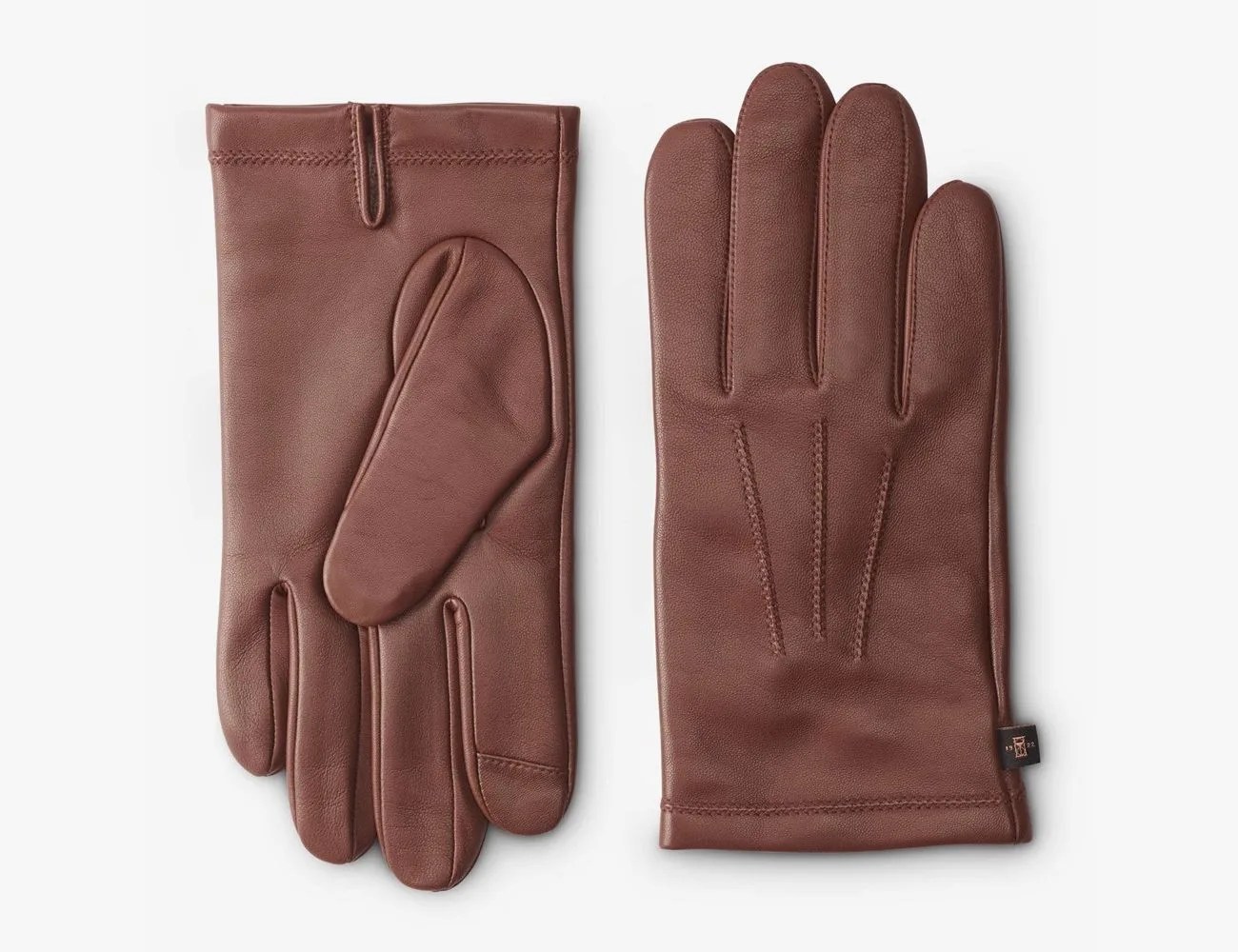 a pair of brown leather gloves
