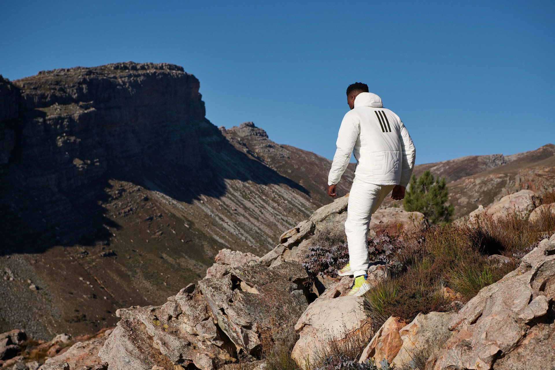 man wearing adidas terrex outfit