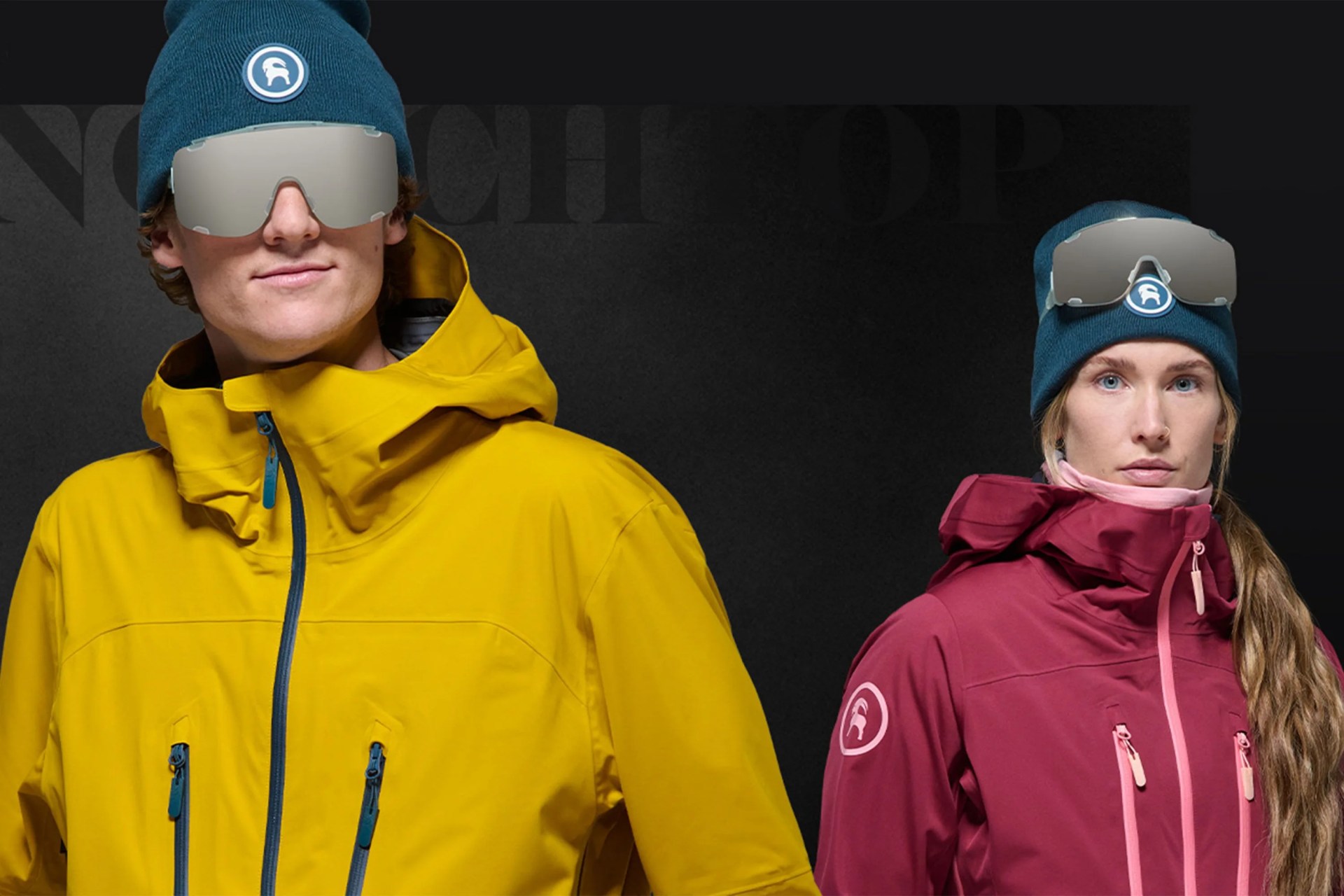 man and woman wearing winter gear