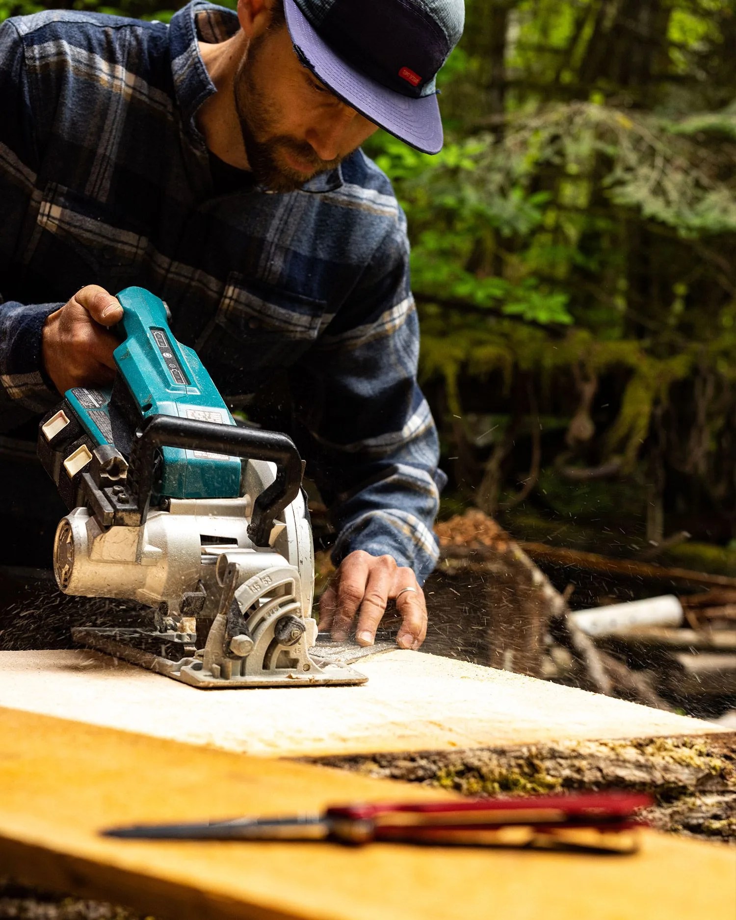man working on lumber