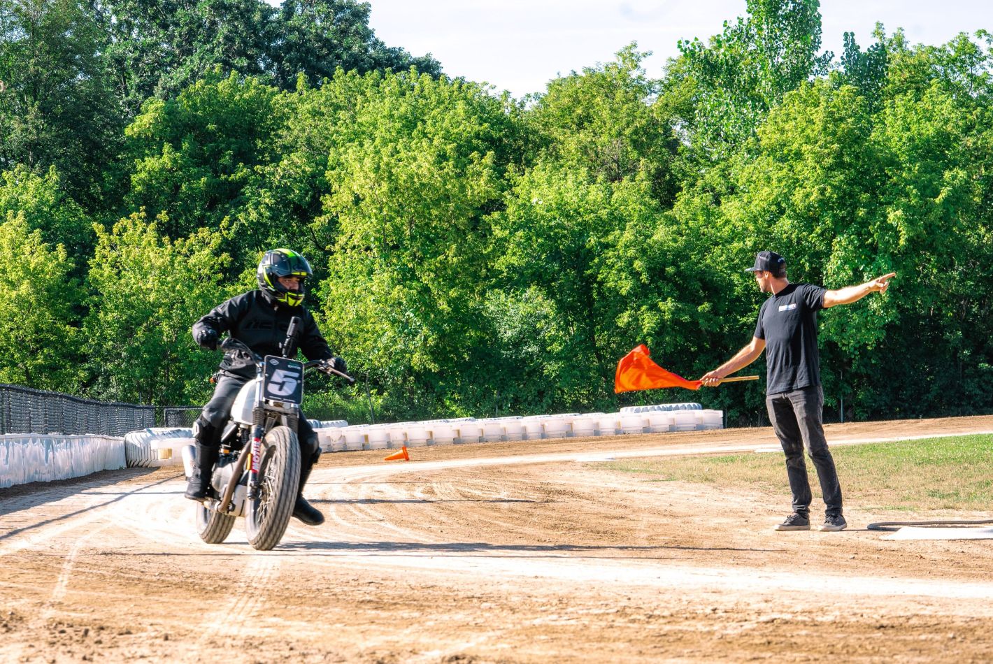 motorcyclist passing finish line