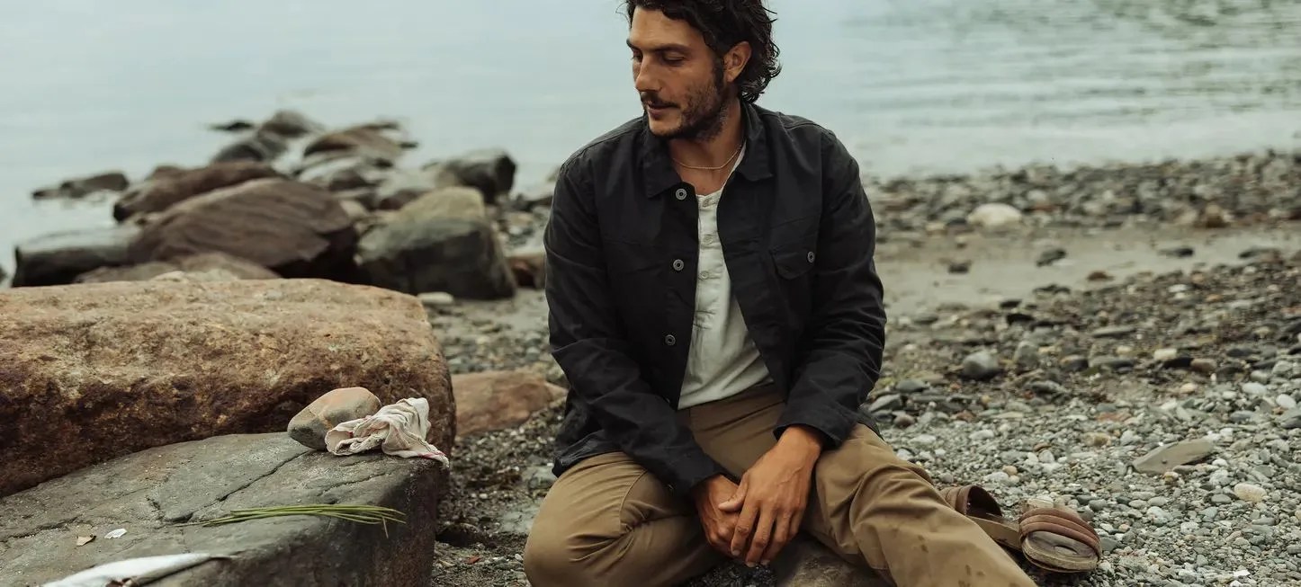 man sitting at beach