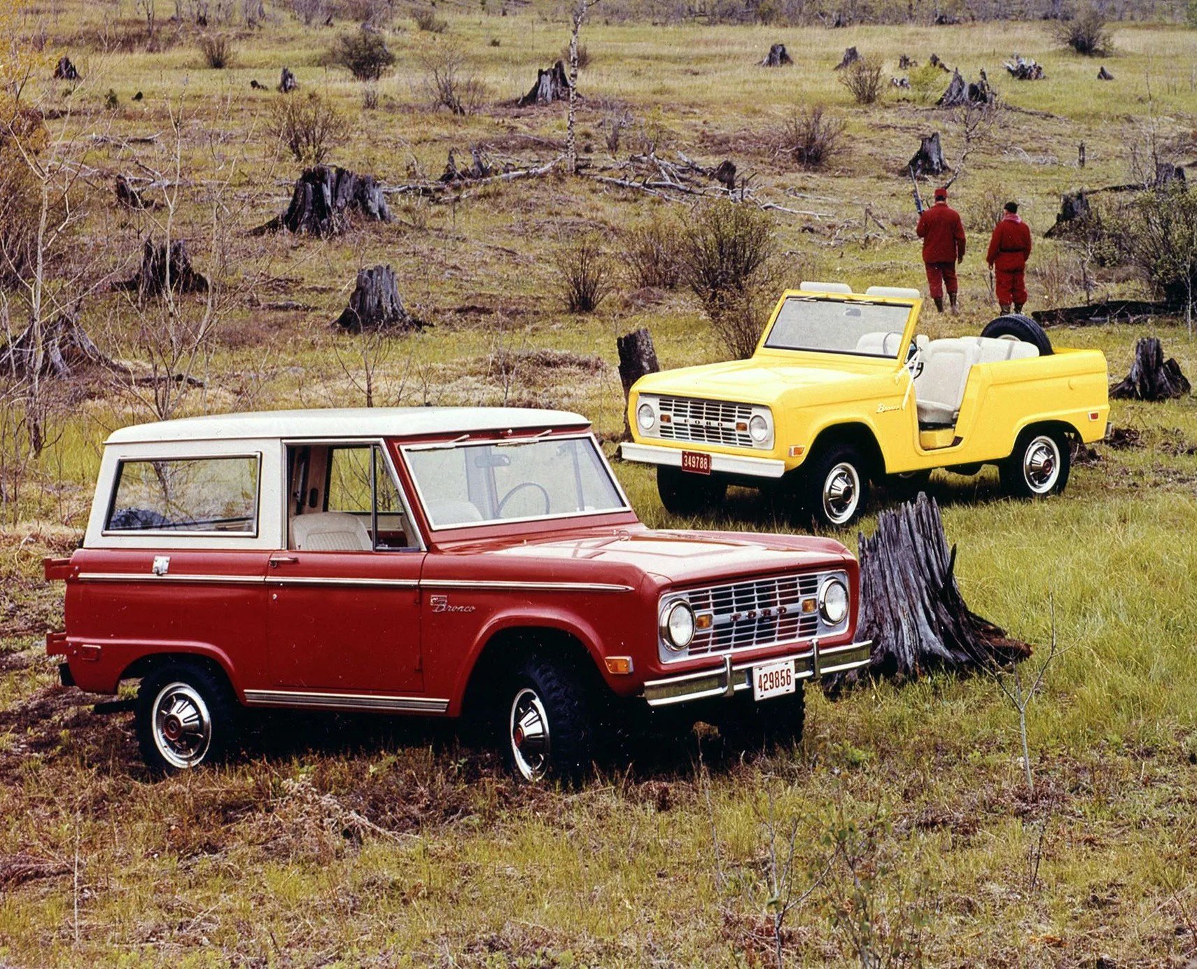 three 1969 bronco cars in red, blue, yellow
