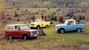 three 1969 bronco cars in red, blue, yellow