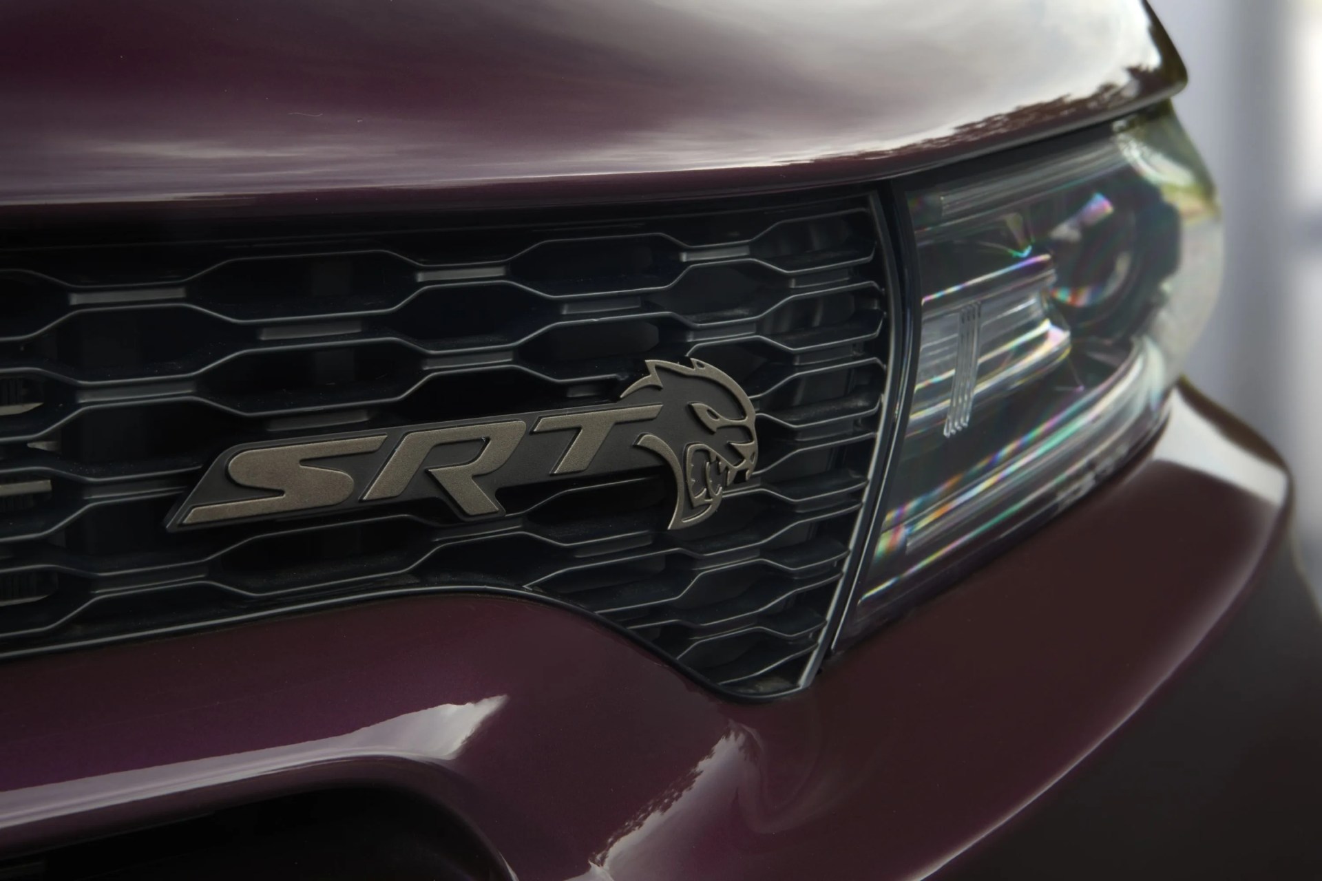 brass monkey hellcat grille badging on the 2022 dodge charger srt hellcat redeye widebody jailbreak charger jailbreak models offer the choice of five exterior badging finishes