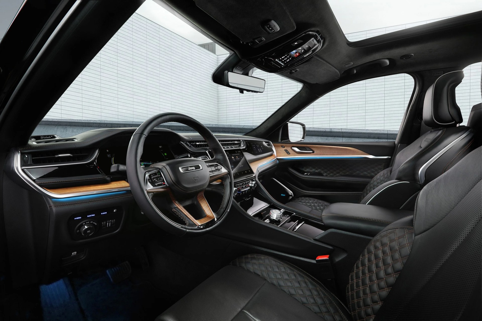 the all new 2022 jeep® grand cherokee summit reserve model’s spacious interior features standard 10 inch display screens, including a frameless digital gauge cluster and 101 inch uconnect 5 touchscreen radio, hand wrapped, quilted palermo leather and open pore waxed walnut wood accents, all new led lighting with ambient features, driver and front passenger seat massage and personalized climate zones