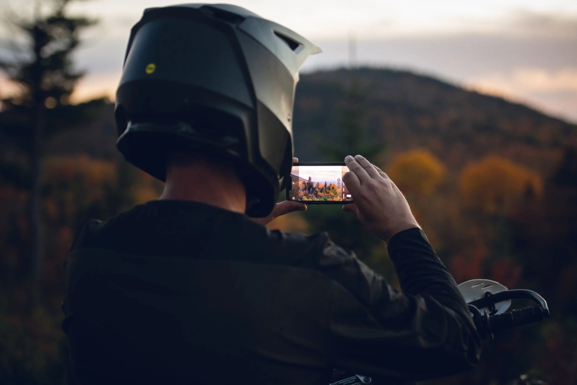 person taking a photo with their phone