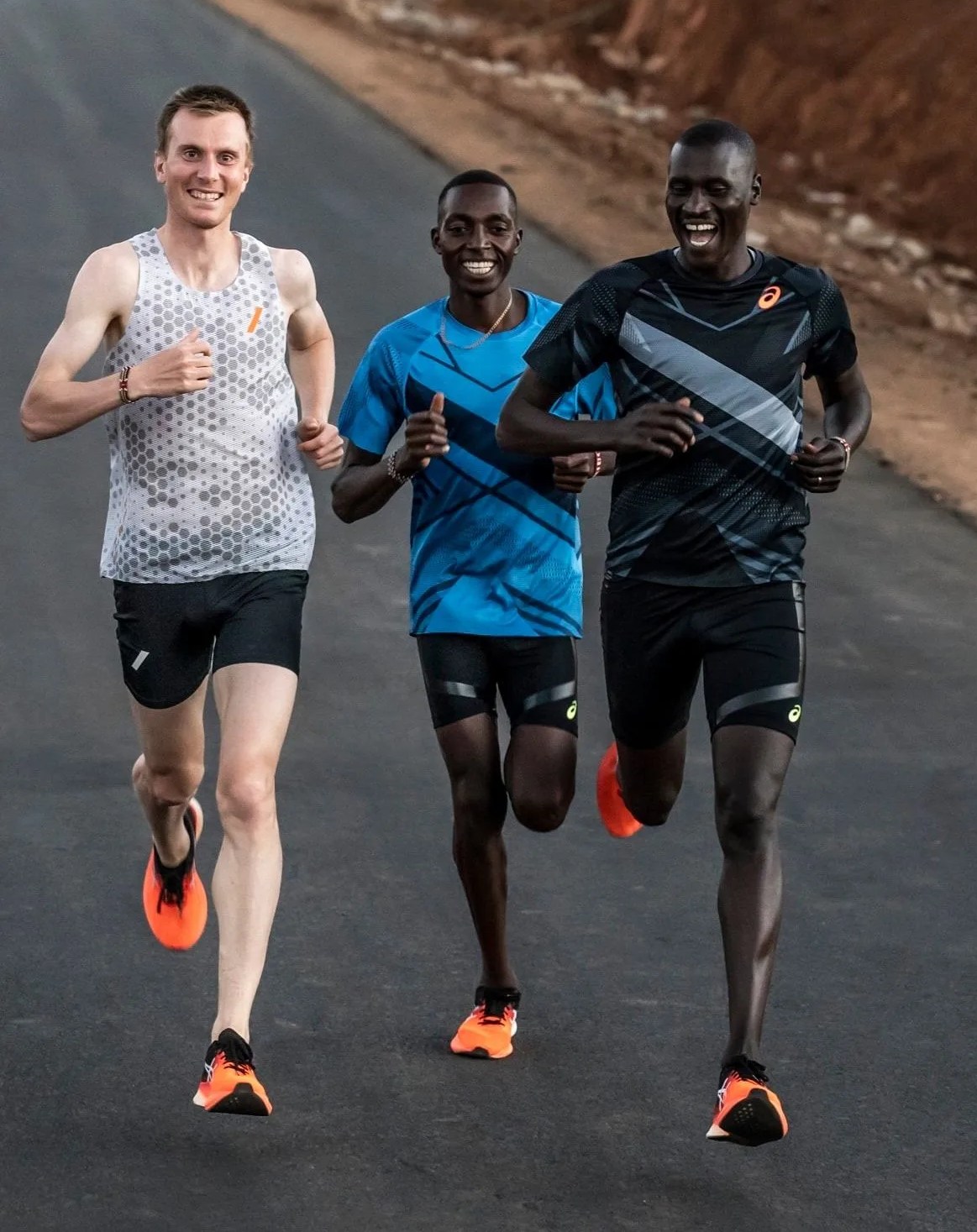men running wearing asics metaspeed sky