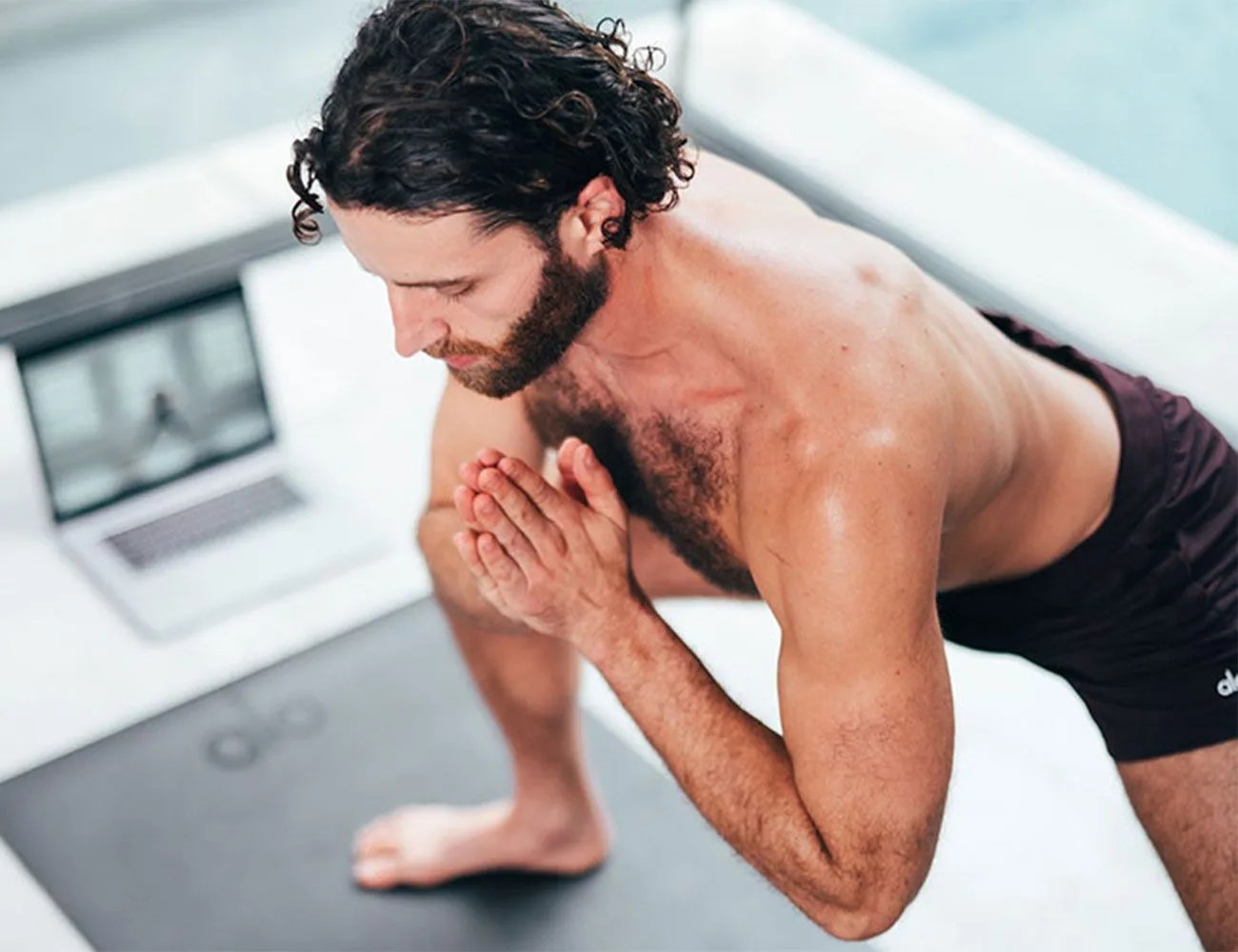 man doing yoga