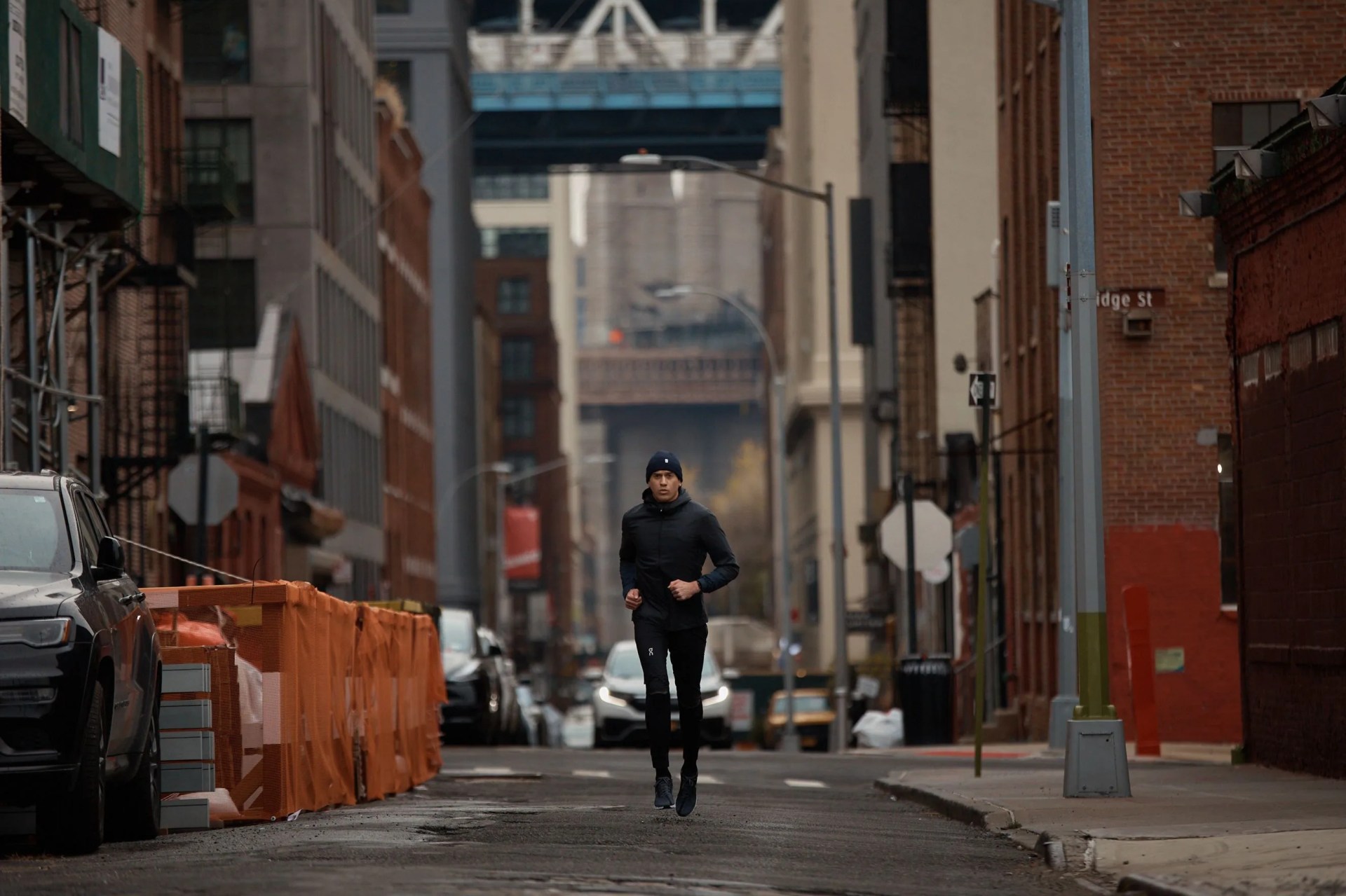 man running through town