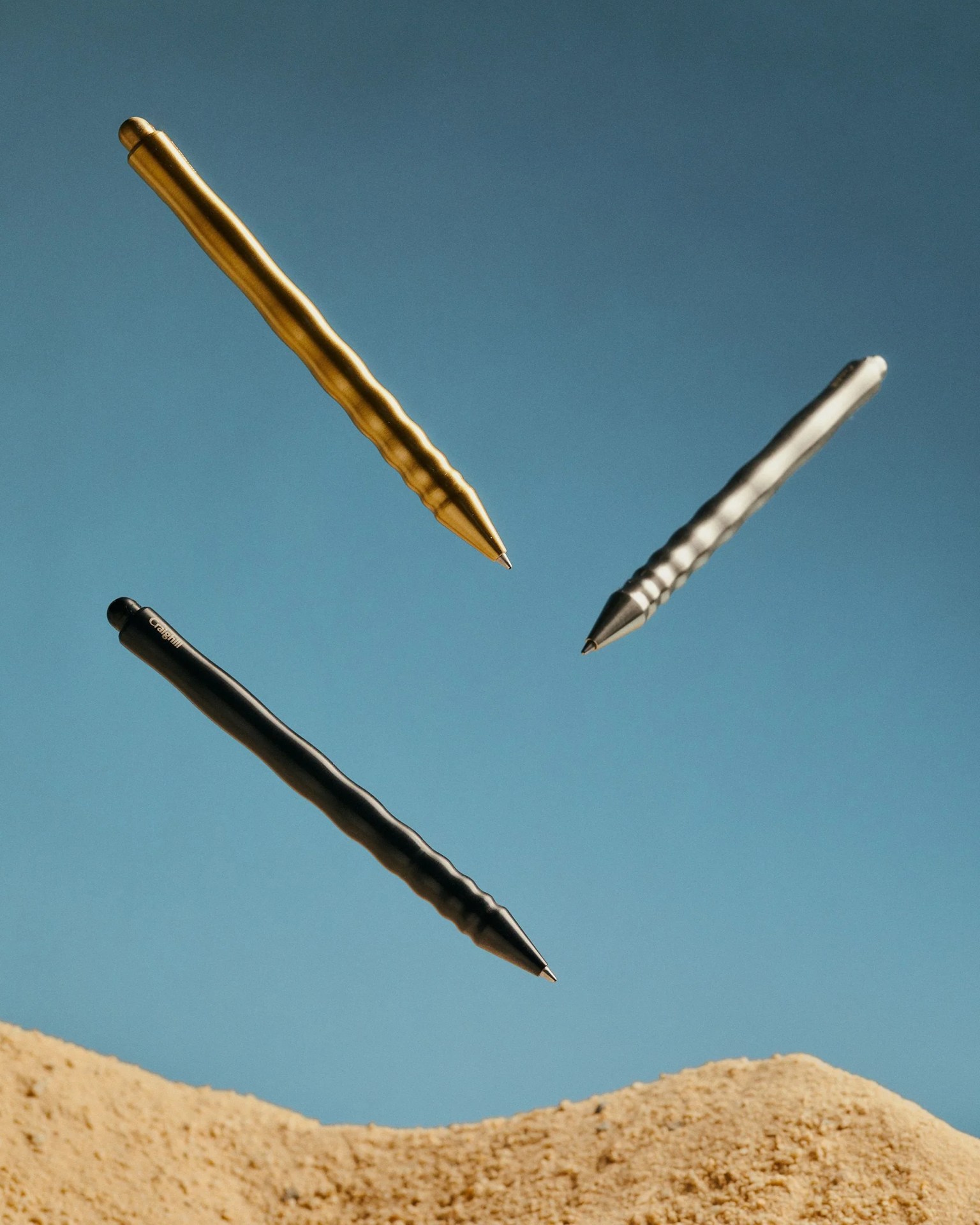 kepler pen in black, gold, and silver