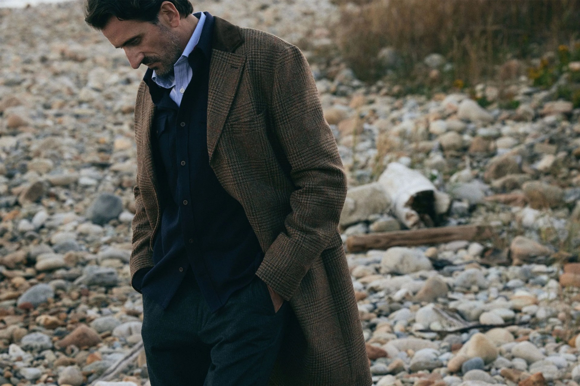 man wearing abner crombie coat in brown plaid