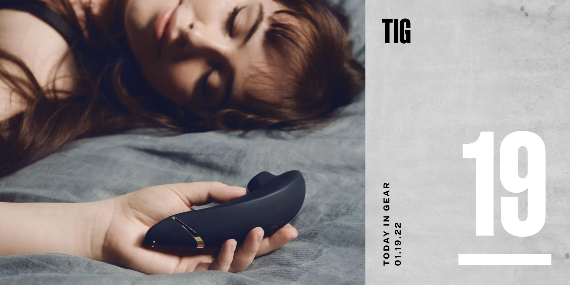 tig jan 19th woman laying on bed with womanizer in hand