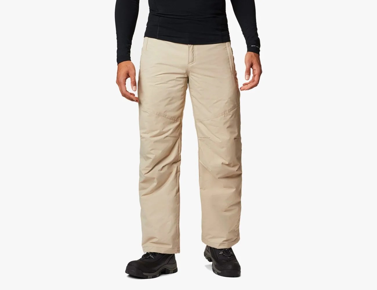 a man wearing khaki snow pants