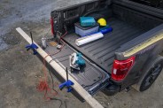 all new f 150 with available pro power onboard, standard clamp pockets so customers can hold materials down for precision work, standard cleats mounted to the sides of the tailgate to act as tie down locations for extra long items in the bed and available tailgate work surface including integrated rulers, a mobile device holder, cupholder and pencil holder