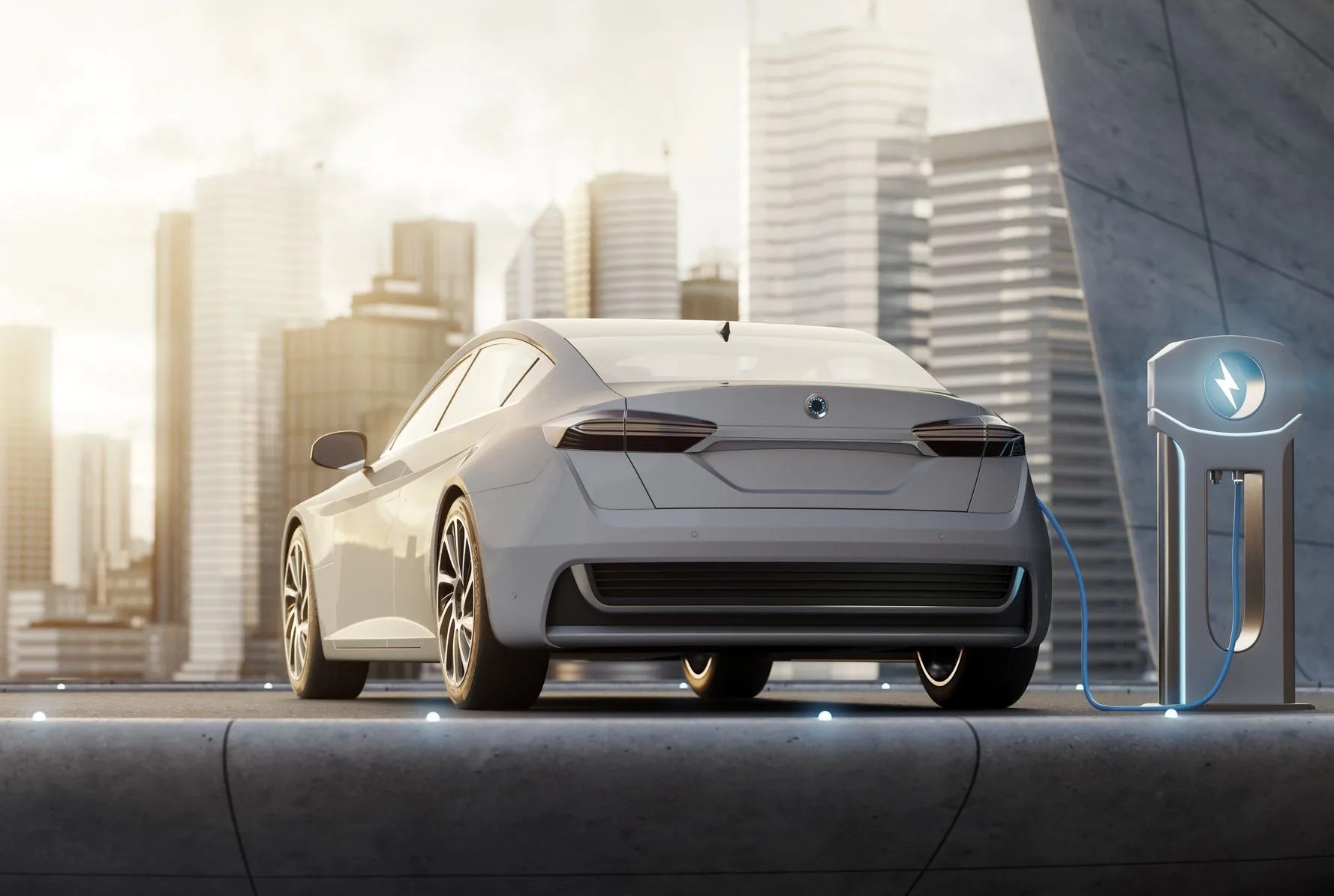 generic car charging at modern architecture with city in background