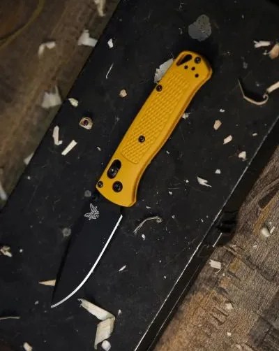 benchmade knife with yellow handle